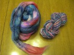 Red, pink, and blue glitter fiber to the left of spun and plied yarn of the same fiber on the right thumbnail.